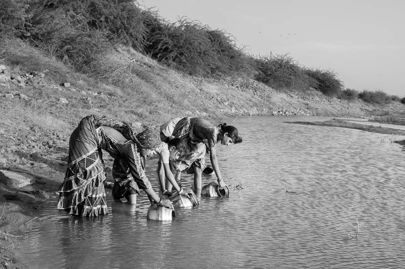 Human Right to Water in Kutch district, Gujarat - Collecting drinking water of questionable quality from a distant pond